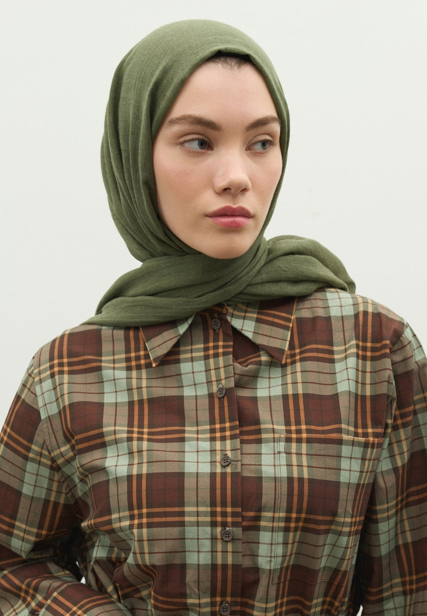 Detail shot of Khaki Cashmere Textured Hijab fabric and stitching