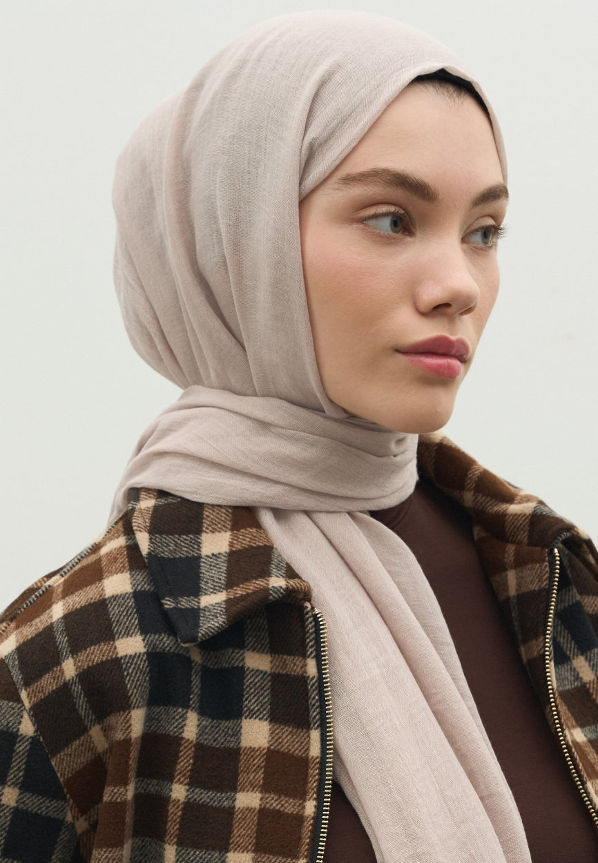 Detail shot of Beige Cashmere Textured Scarf fabric and stitching