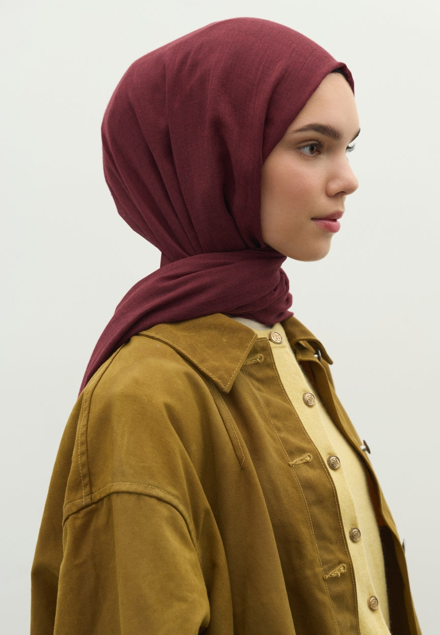 Detail shot of Burgundy Cashmere Textured Scarf fabric and stitching