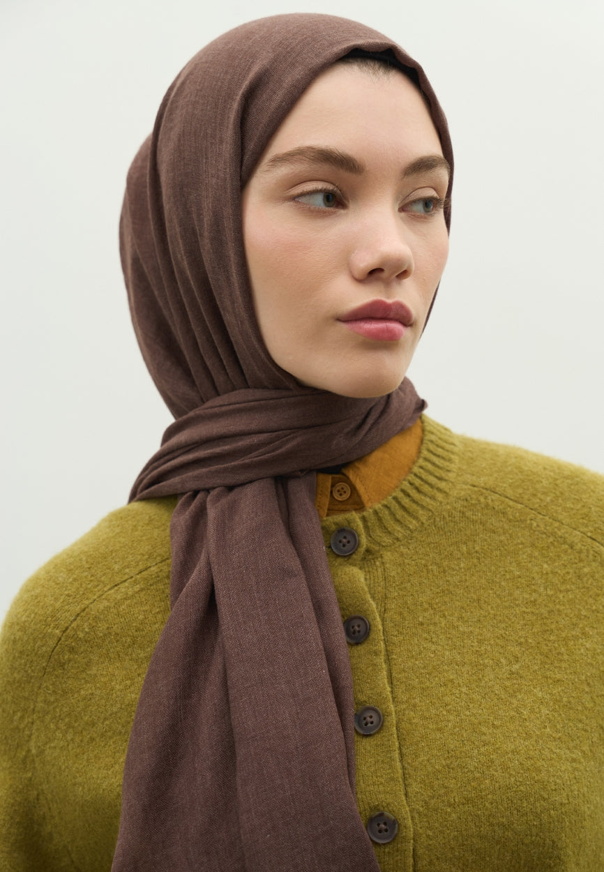 Detail shot of Cocoa Cashmere Textured Scarf fabric and stitching