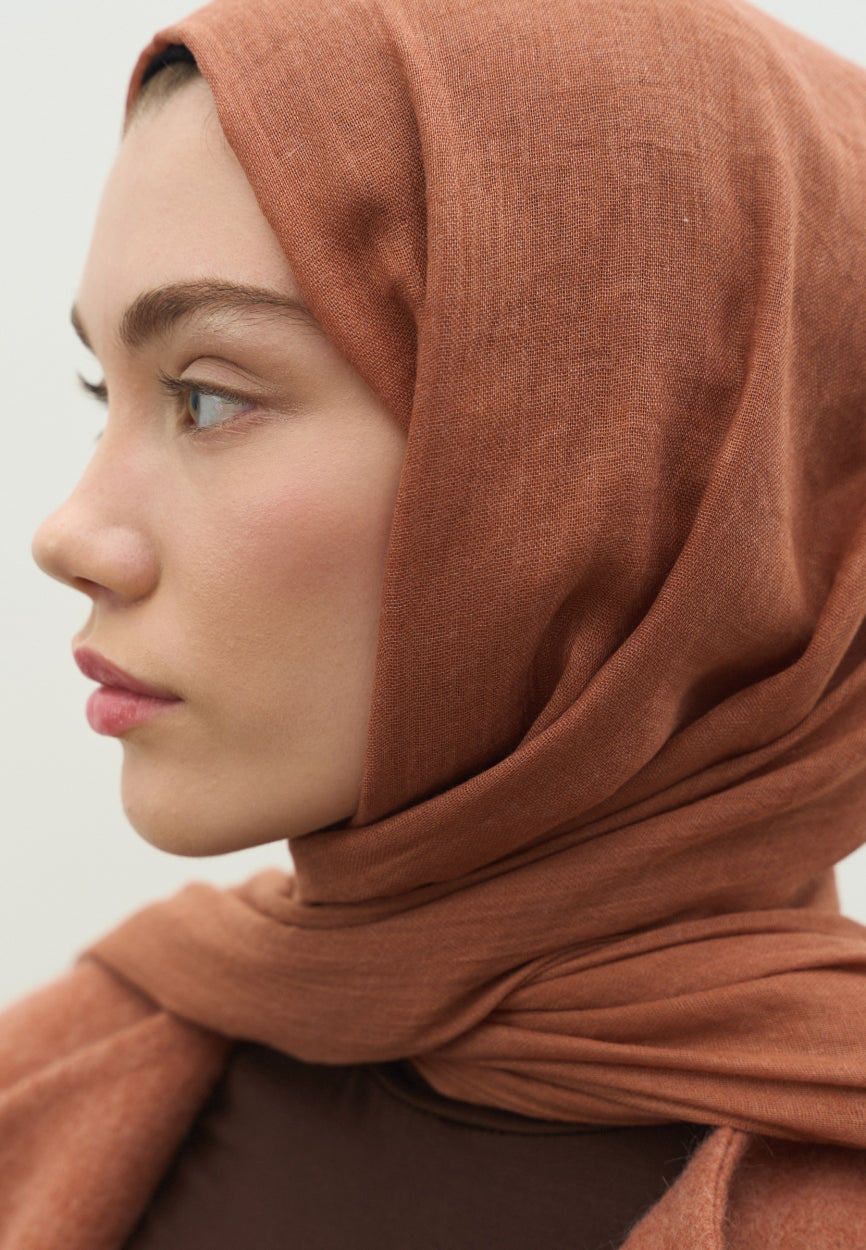 Detail shot of Copper Cashmere Textured Scarf fabric and stitching