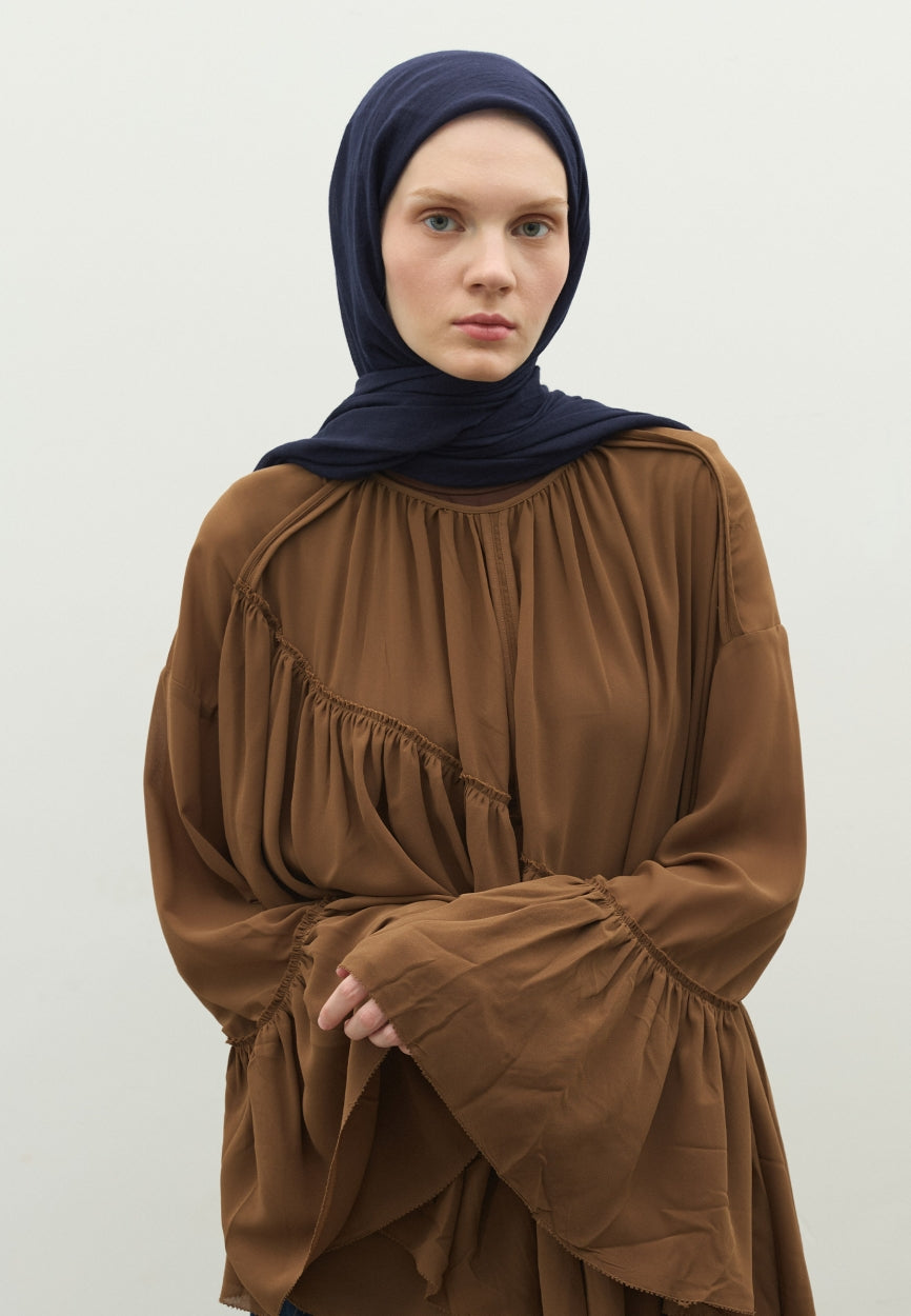 Detail shot of Navy Blue Cashmere Textured Scarf Dark fabric and stitching