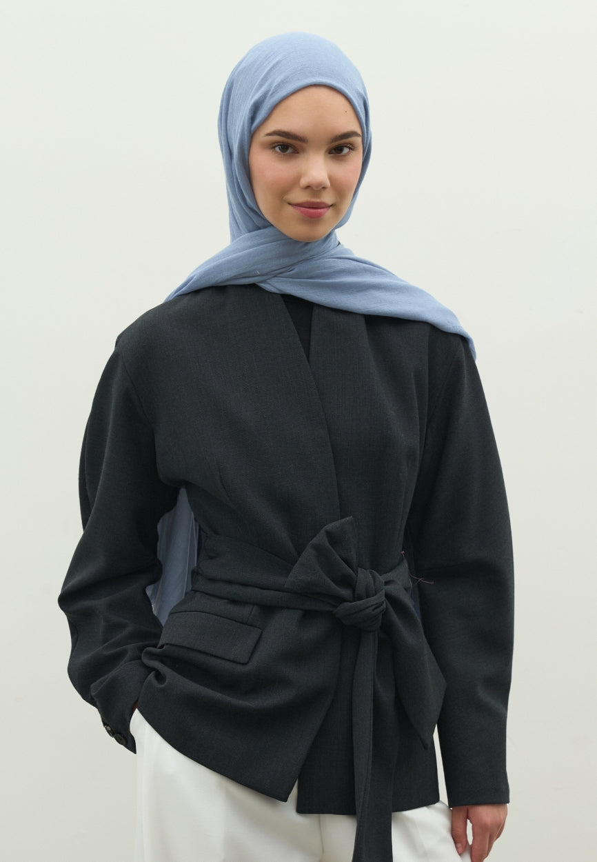 Detail shot of Blue Cashmere Textured Scarf Denim fabric and stitching