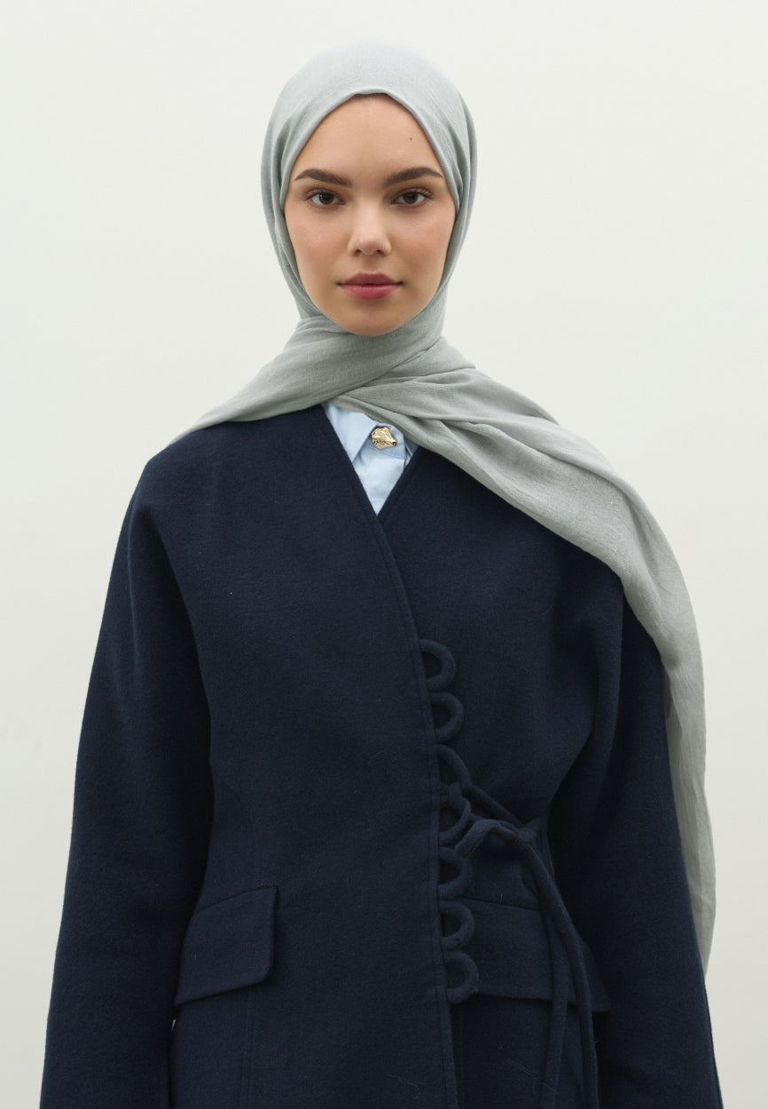 Detail shot of Silver Cashmere Textured Scarf fabric and stitching