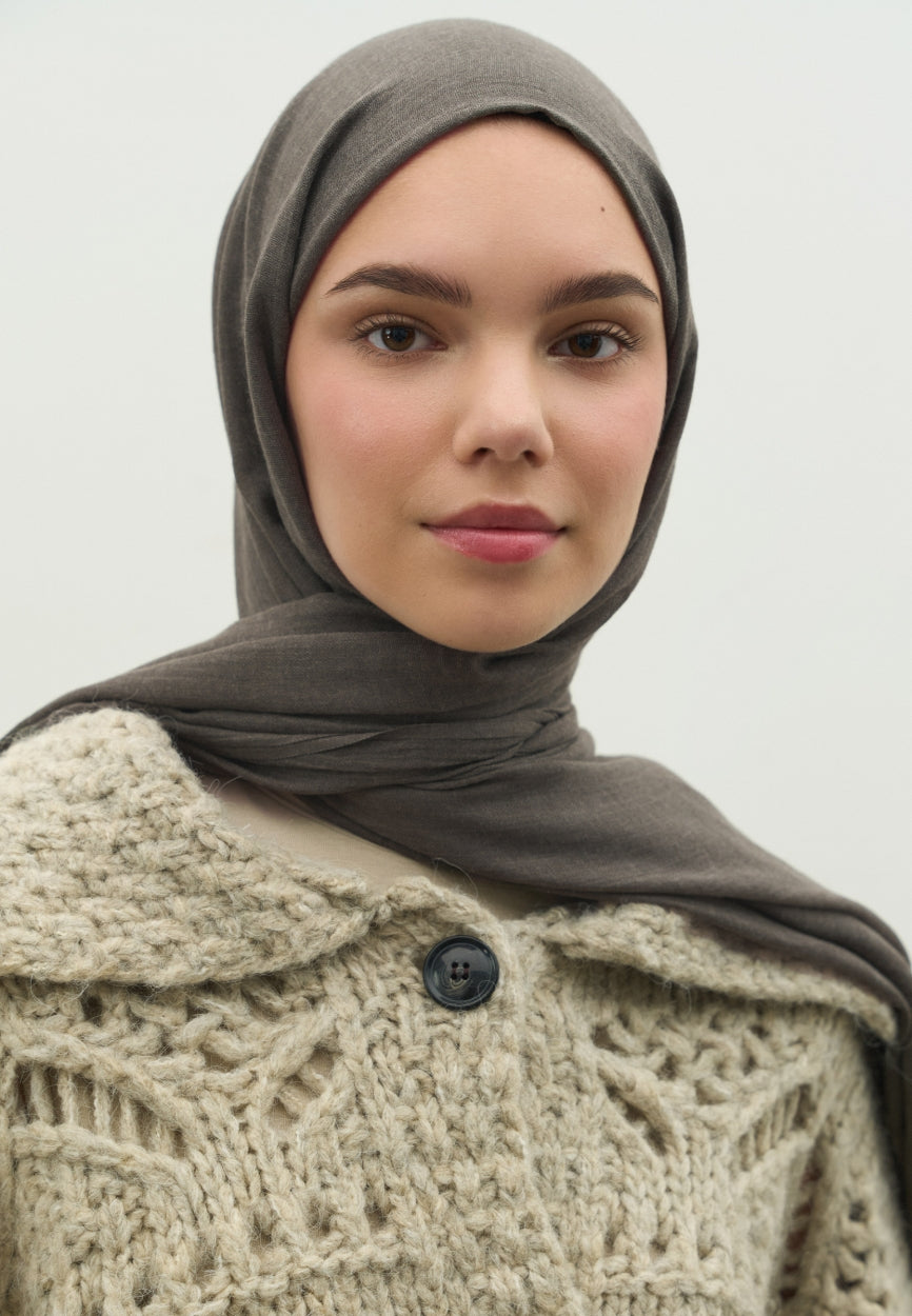 Detail shot of Smoke Cashmere Textured Scarf fabric and stitching