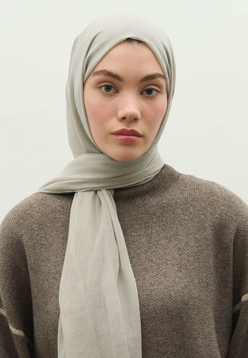 Detail shot of Stone Cashmere Textured Scarf fabric and stitching