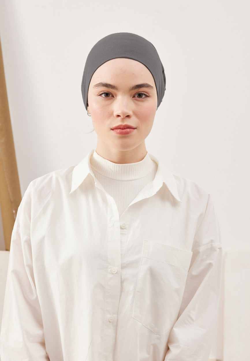 Detail shot of Gray Large Volume Practical Bonnet Dark fabric and stitching