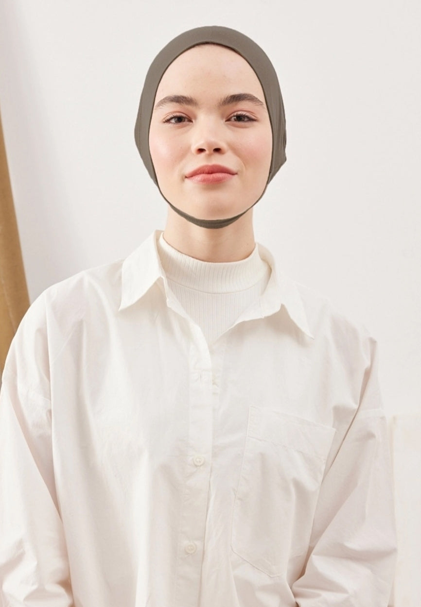 Detail shot of Mink Large Volume Practical Bonnet Dark fabric and stitching