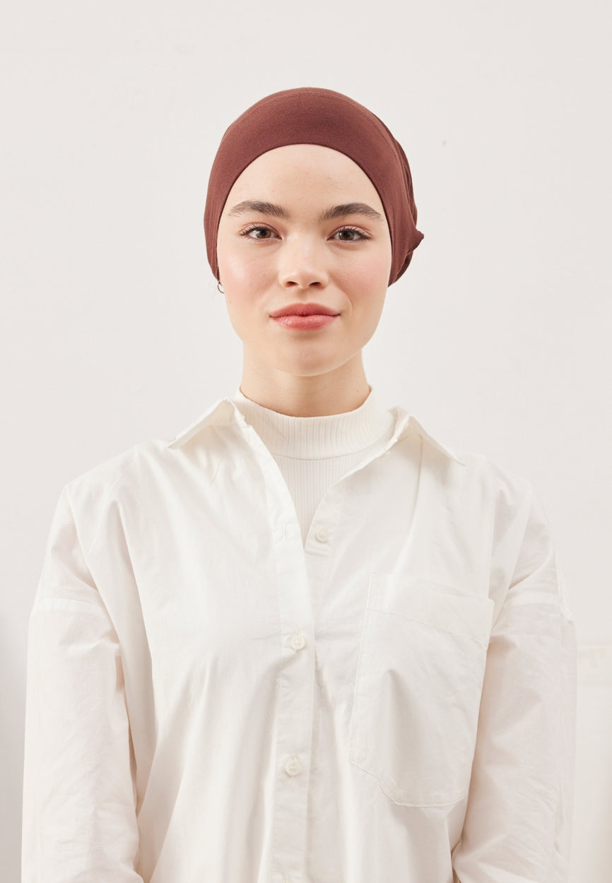 Detail shot of Brown Large Volume Practical Bonnet Light fabric and stitching