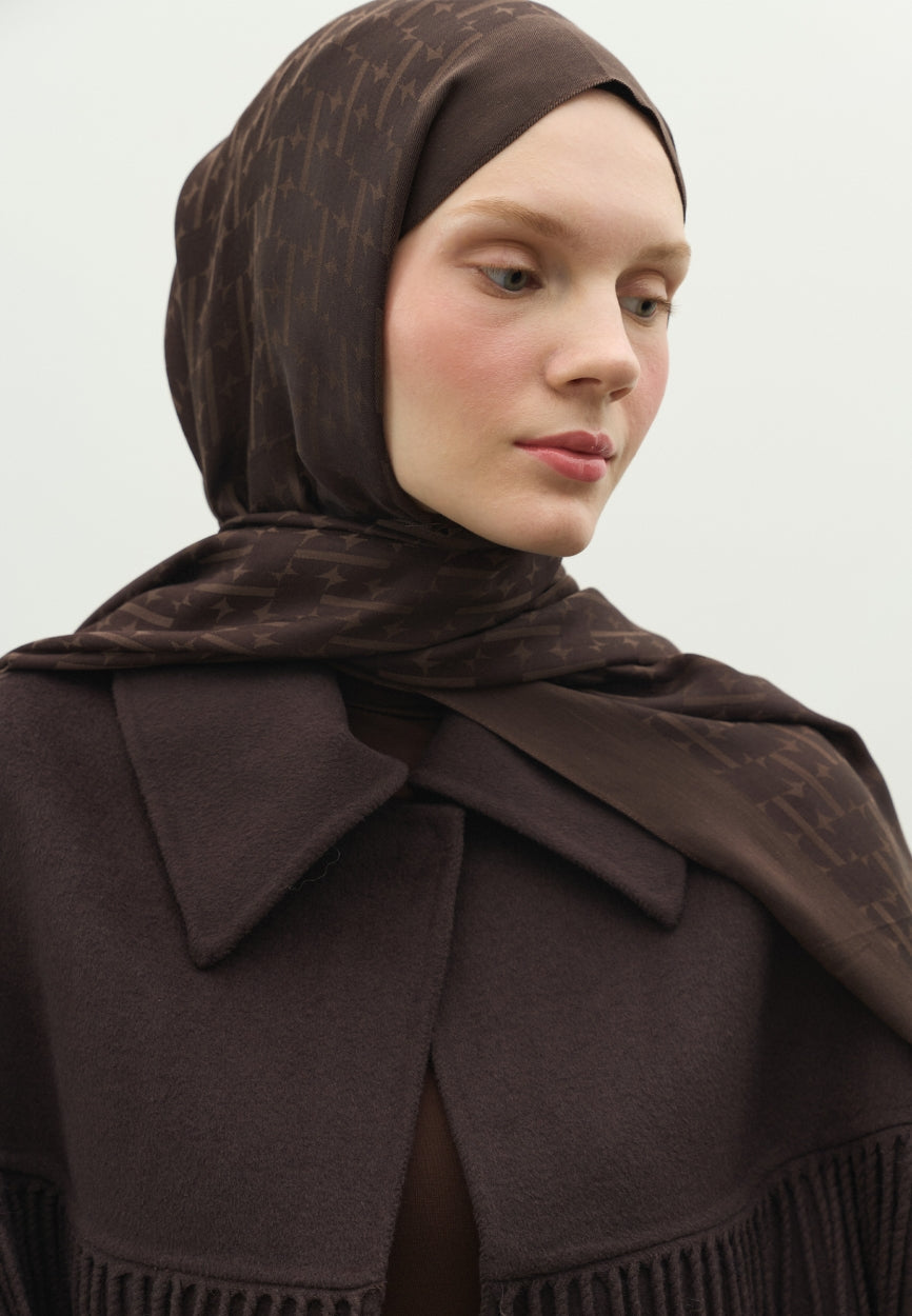 Detail shot of Brown Monogram Cotton Flush Jacquard Hijab Bitter fabric and stitching