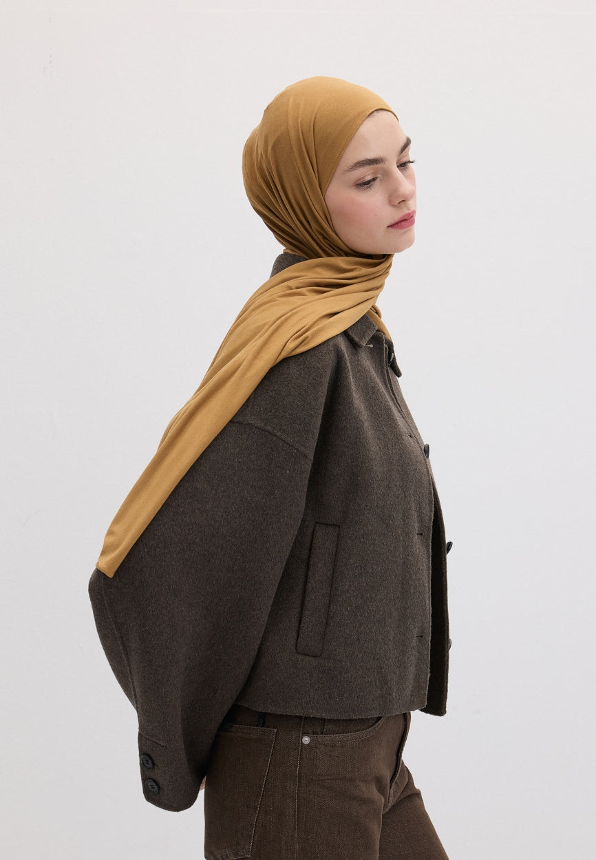 Qivola Bamboo Jersey Scarf in Camel, back view