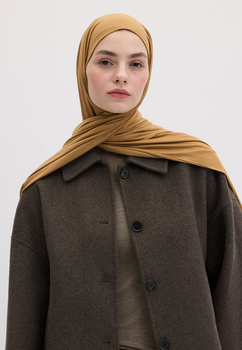 Qivola Bamboo Jersey Scarf in Camel, side view