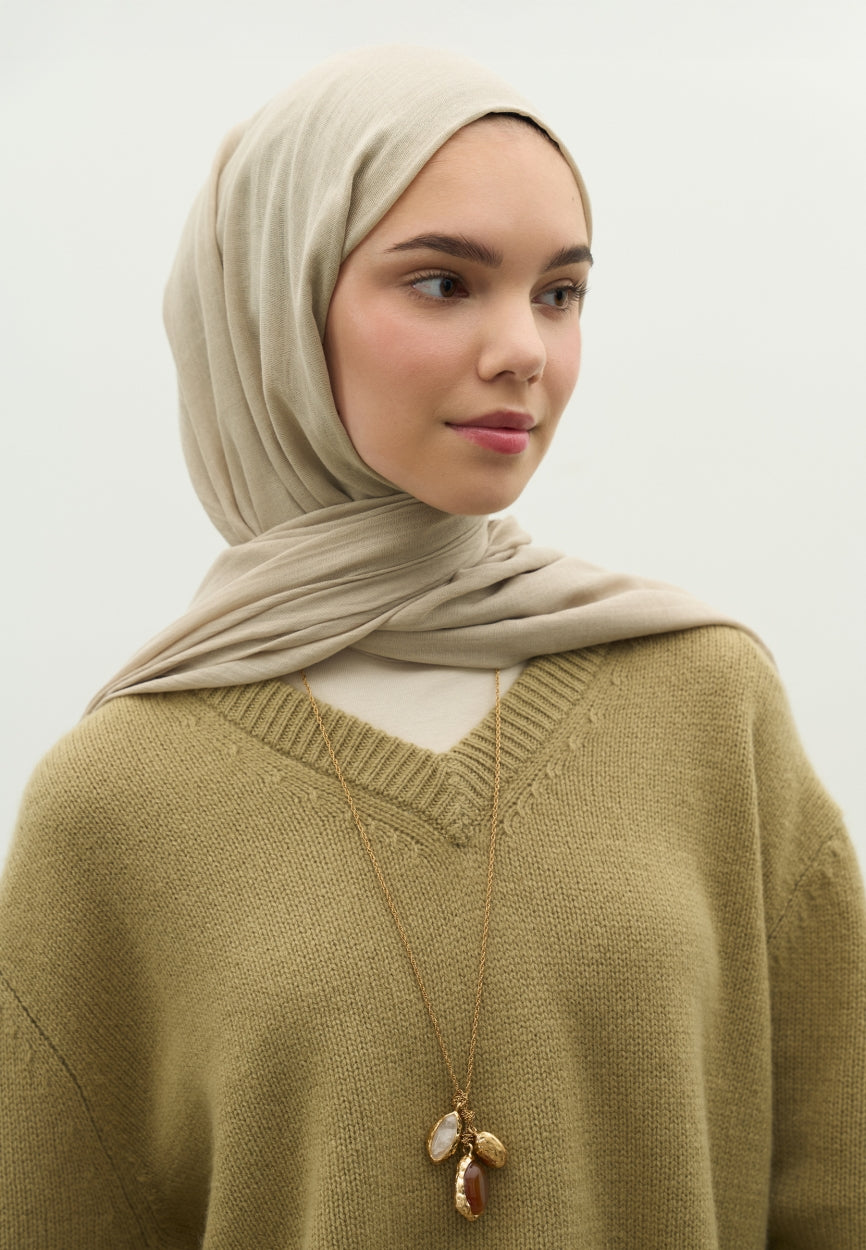 Beige Cashmere Textured Scarf Natural side angle showing elegant silhouette