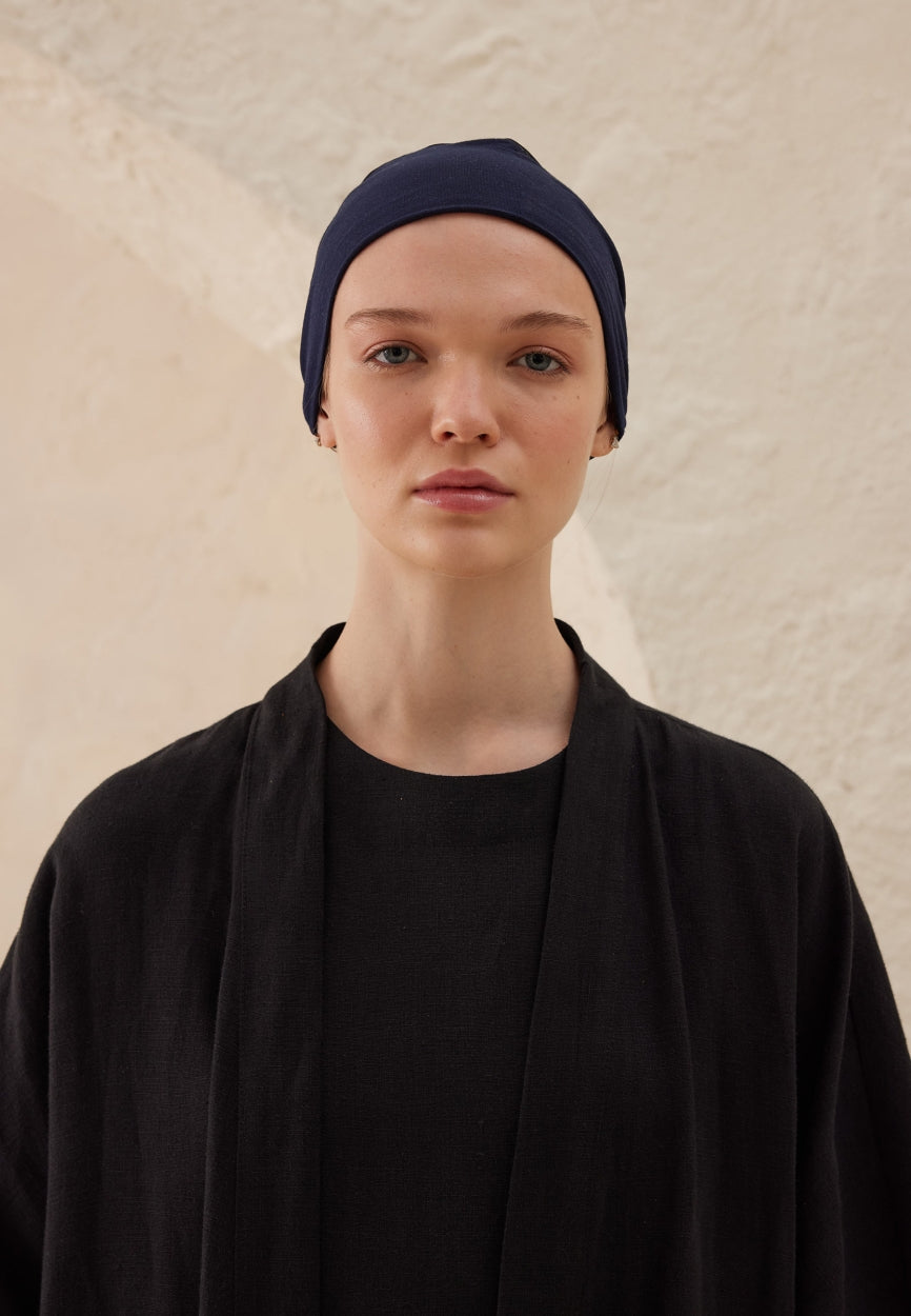 Blue Silicone Non-Slip Net Bonnet Dark side angle showing elegant silhouette