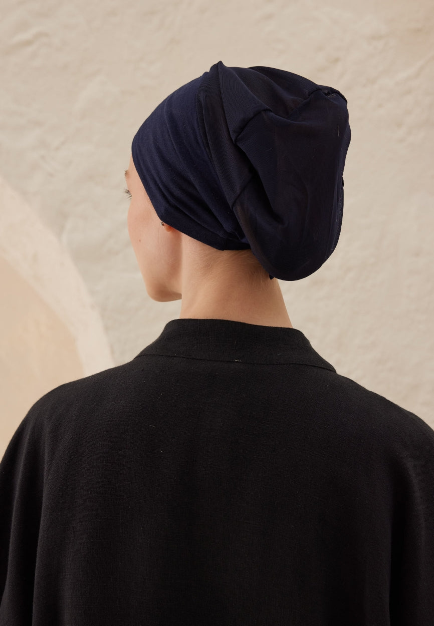 Back view of Blue Silicone Non-Slip Net Bonnet Dark displaying full coverage design