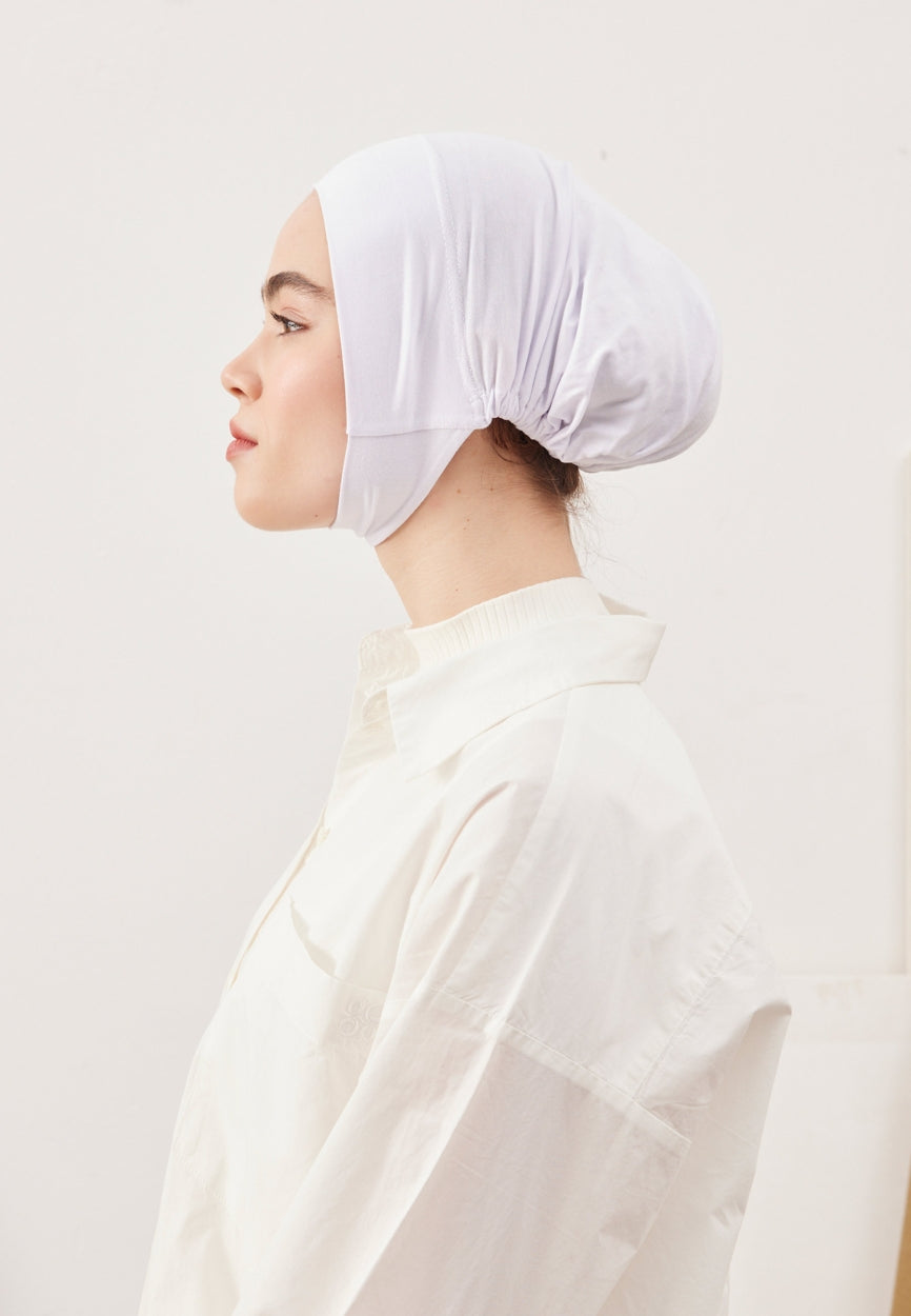 White Large Volume Practical Bonnet side angle showing elegant silhouette