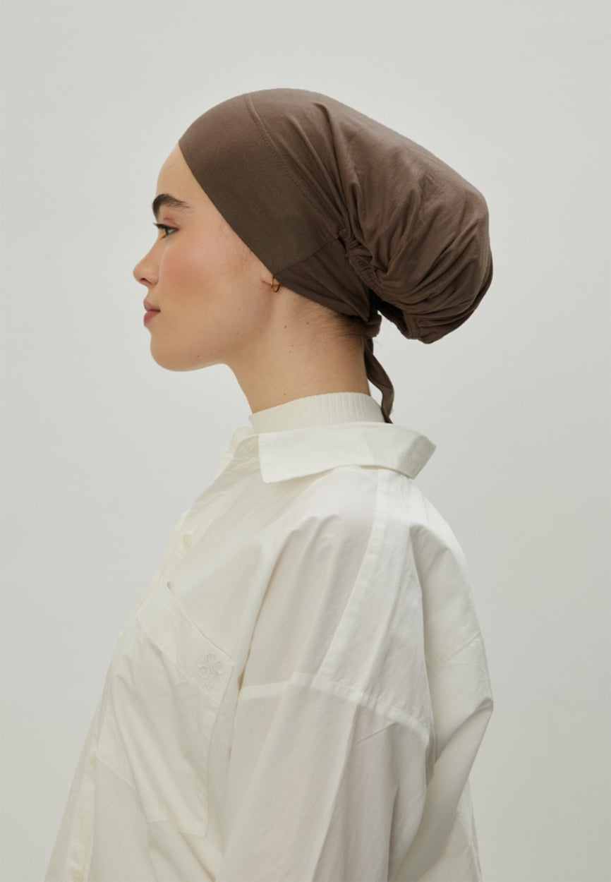 Mink Large Volume Tie Bonnet side angle showing elegant silhouette