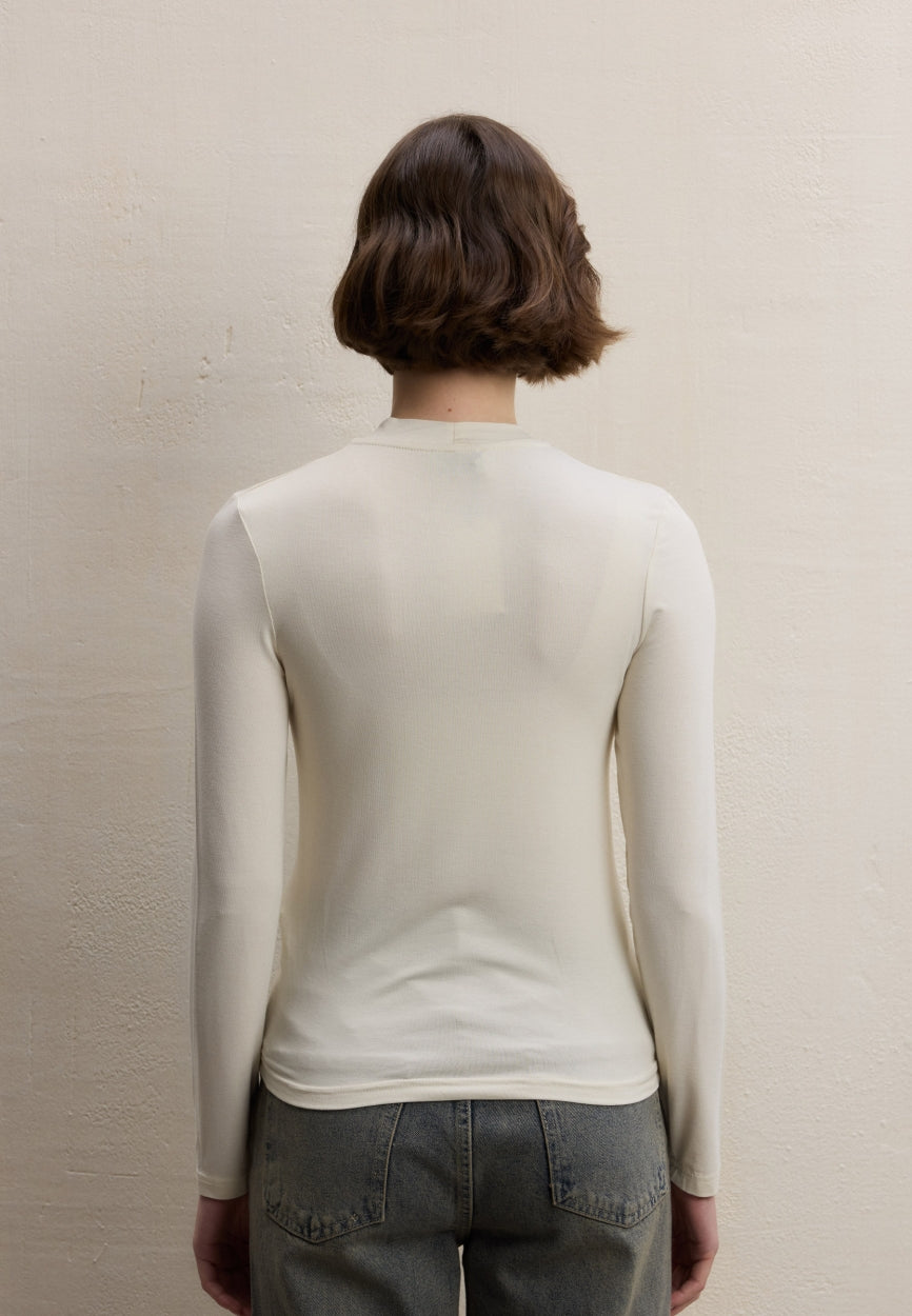 Qivola Long Sleeve Bamboo Body Undershirt in Pearl, back view