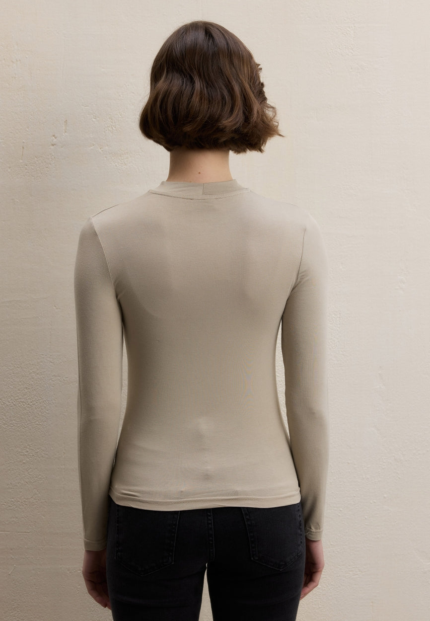 Qivola Long Sleeve Bamboo Body Undershirt in Stone, back view