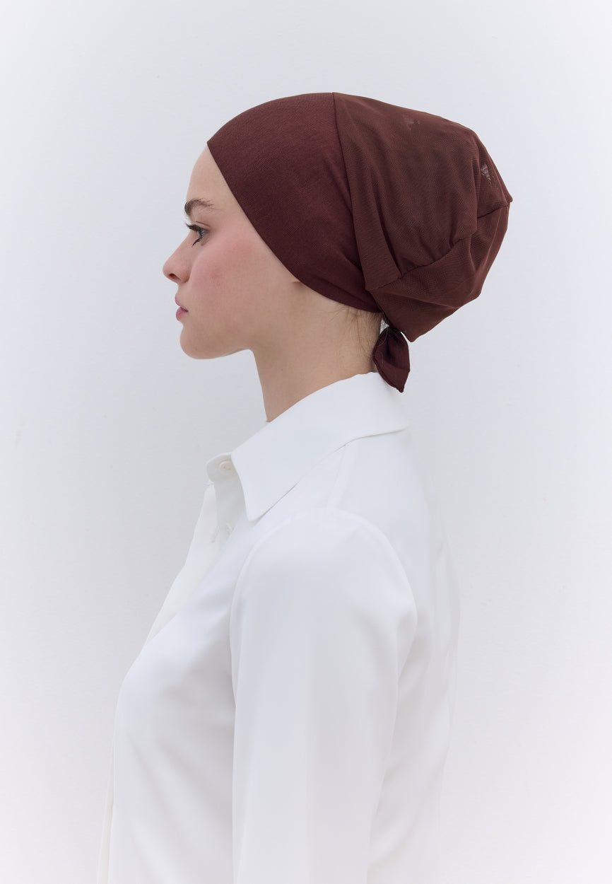 Brown Seamless Mesh Plain Bonnet side angle showing elegant silhouette