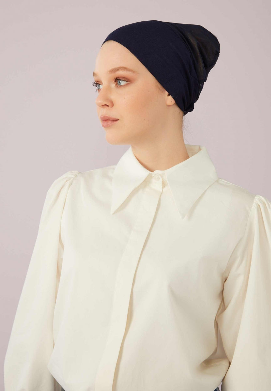 Blue Seamless Mesh Plain Bonnet Navy side angle showing elegant silhouette