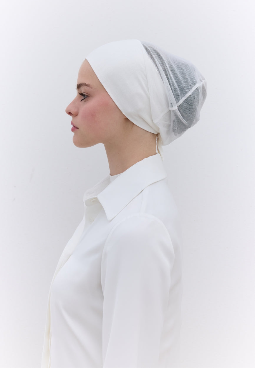 White Seamless Mesh Plain Bonnet Off side angle showing elegant silhouette