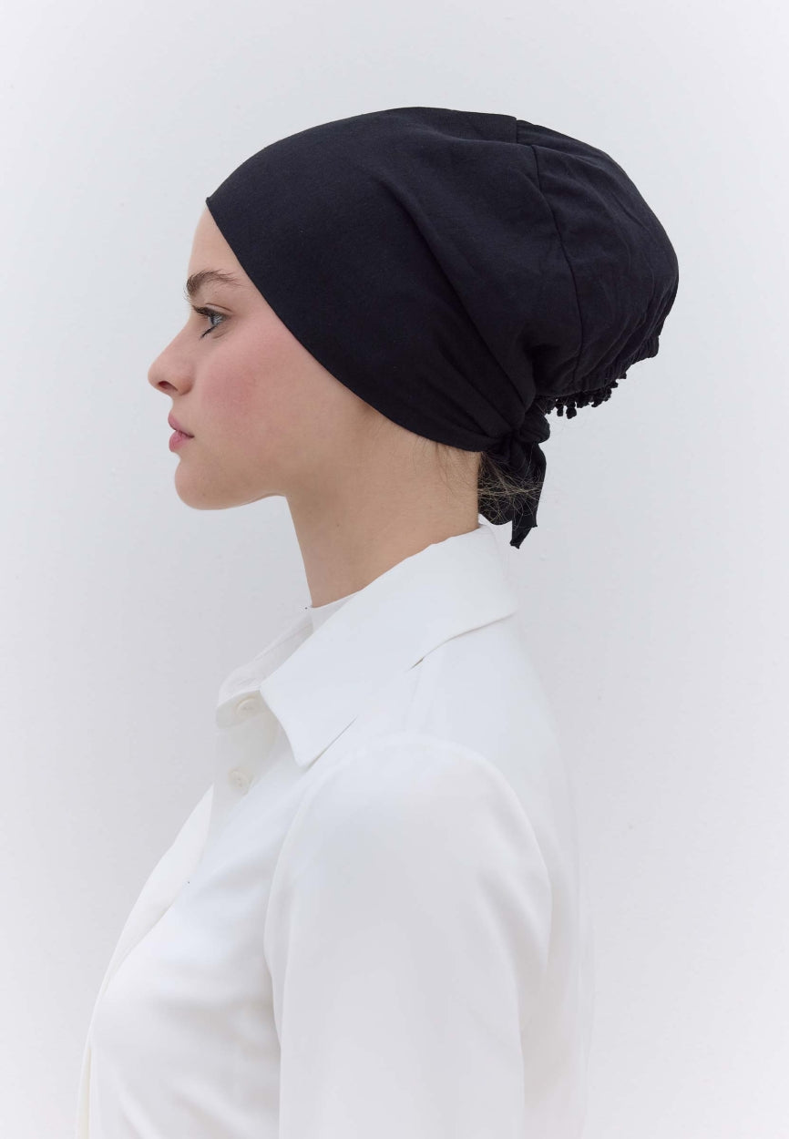Black Seamless Plain Bonnet (Eva) side angle showing elegant silhouette