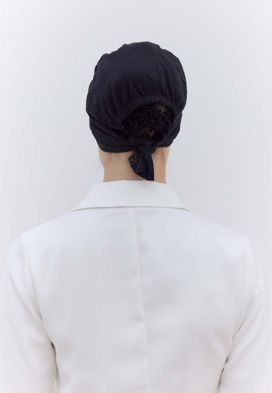 Back view of Black Seamless Plain Bonnet (Eva) displaying full coverage design