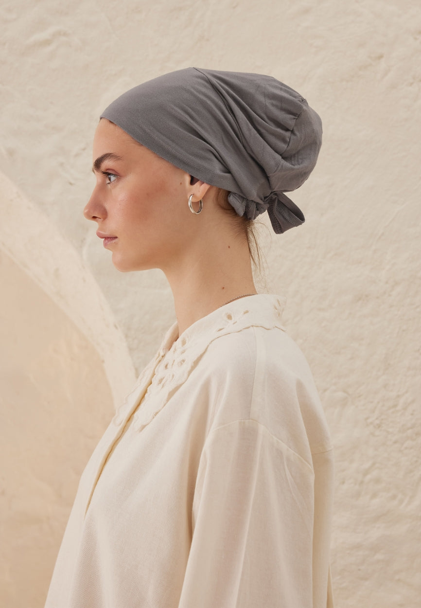 Smoked Silicone Non-Slip Bonnet side angle showing elegant silhouette