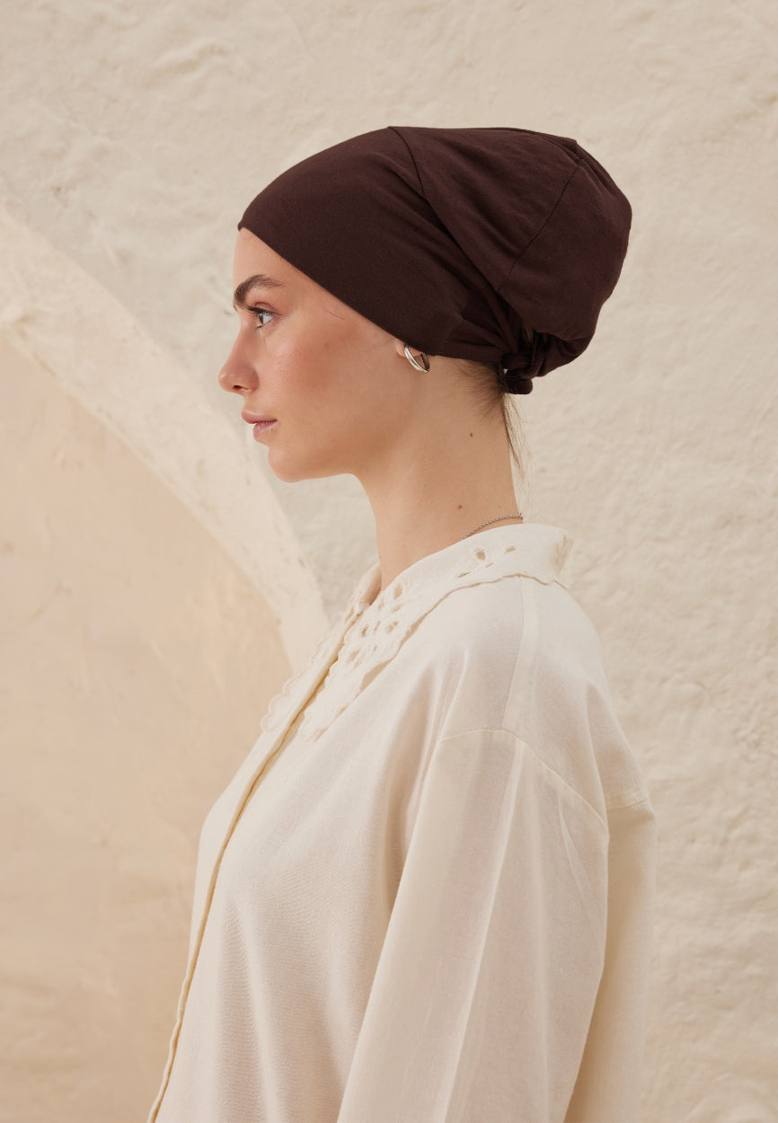 Back view of Coffee Silicone Non-Slip Bonnet Bitter displaying full coverage design