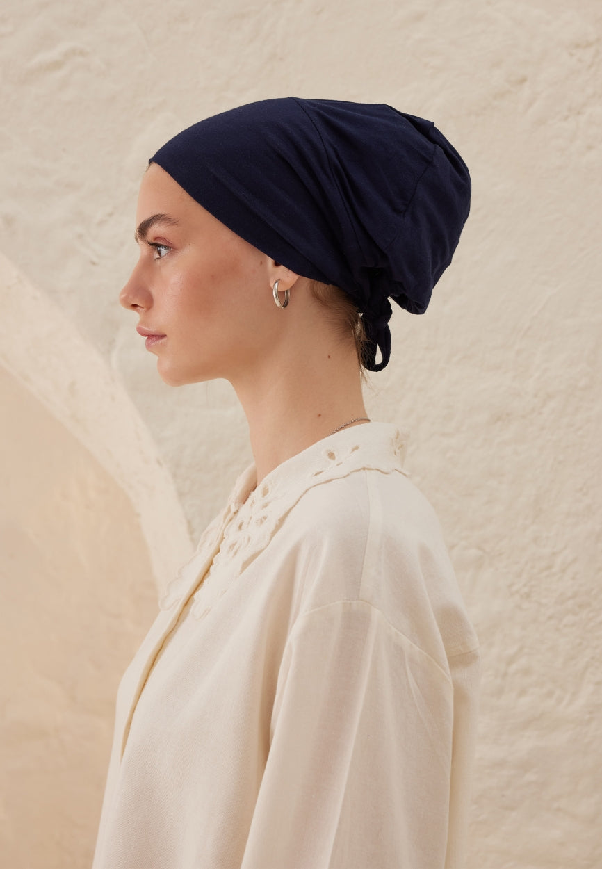 Blue Silicone Non-Slip Bonnet Dark side angle showing elegant silhouette