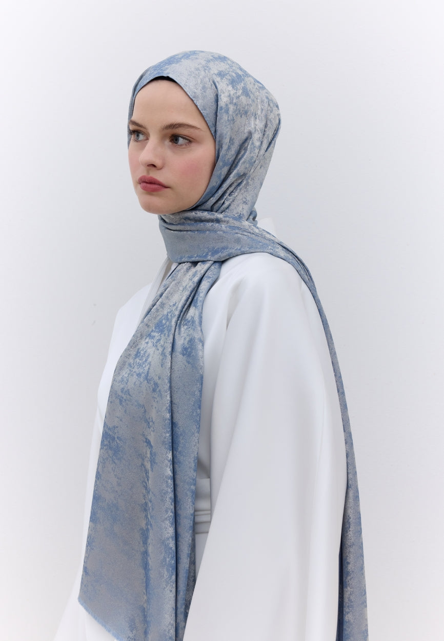 Qivola Silky Shimmery Scarf in Blue, back view