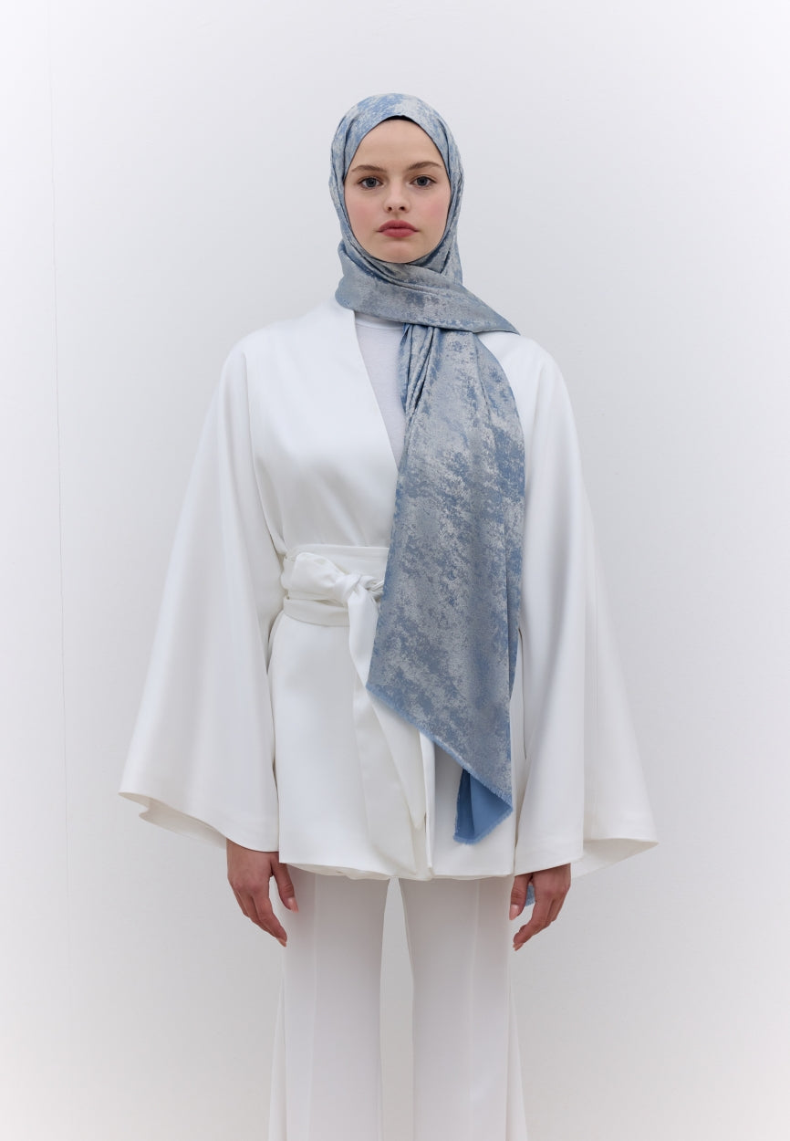 Qivola Silky Shimmery Scarf in Blue, side view