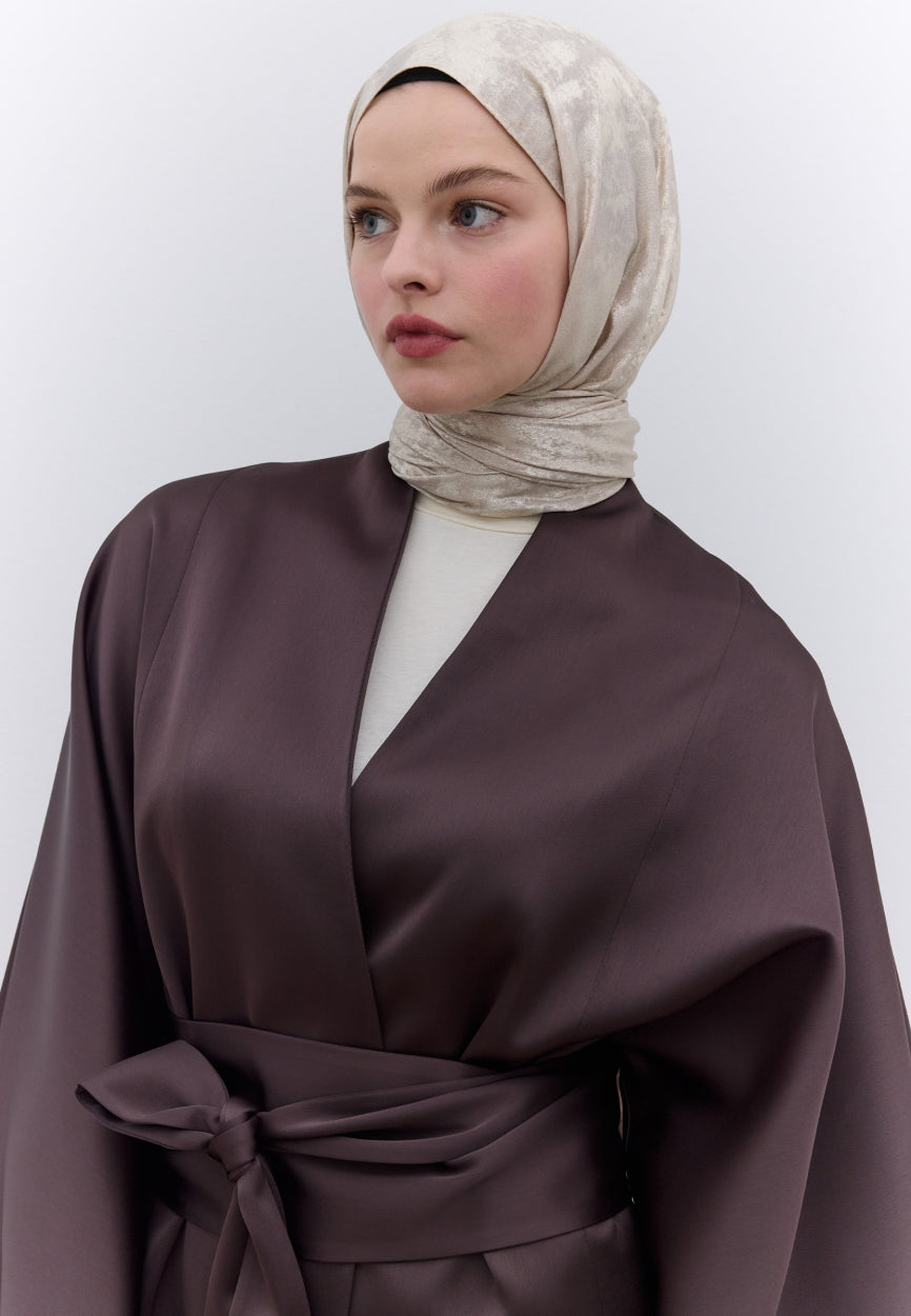 Qivola Silky Shimmery Scarf in Nude, back view