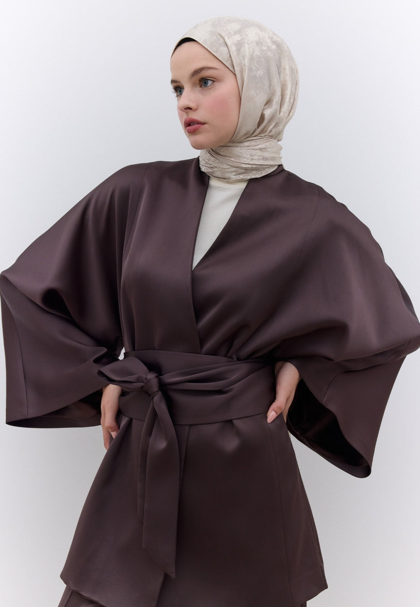 Qivola Silky Shimmery Scarf in Nude, front view