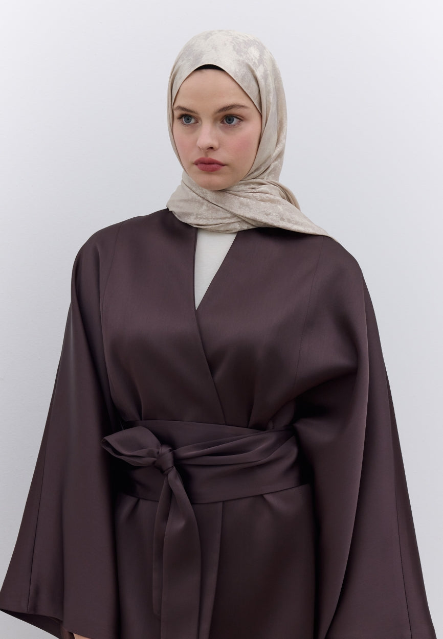 Qivola Silky Shimmery Scarf in Nude, side view